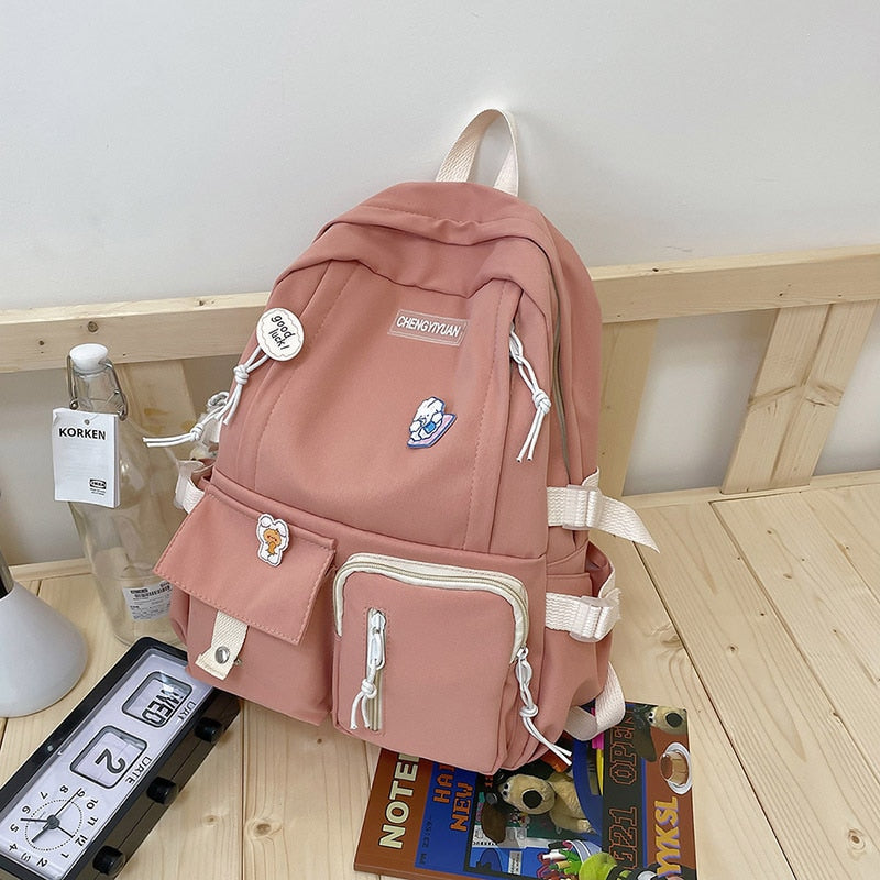 eybag Korean Schoolbag New Cute Girl Backpack Campus Large Capacity Junior High School Students Cute Backpack with Medal Pendant