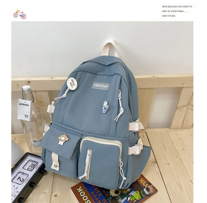 eybag Korean Schoolbag New Cute Girl Backpack Campus Large Capacity Junior High School Students Cute Backpack with Medal Pendant